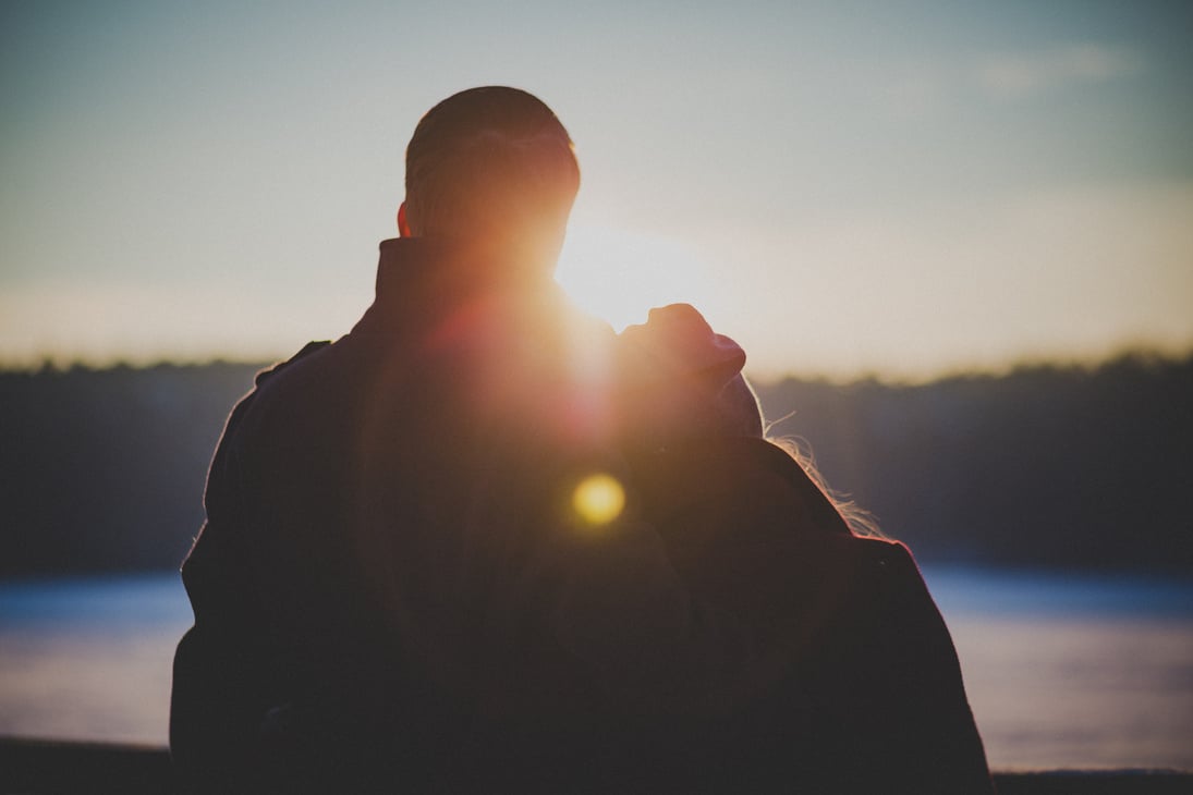 Silhouette of Coupe Standing during Golden Hour